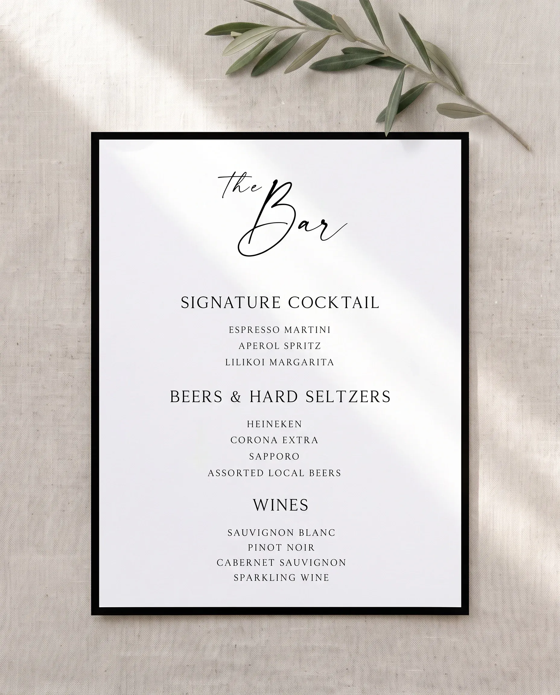 Lumen Frame — single page bar menu shown flat on premium editorial paper under soft natural light, wedding bar menu.