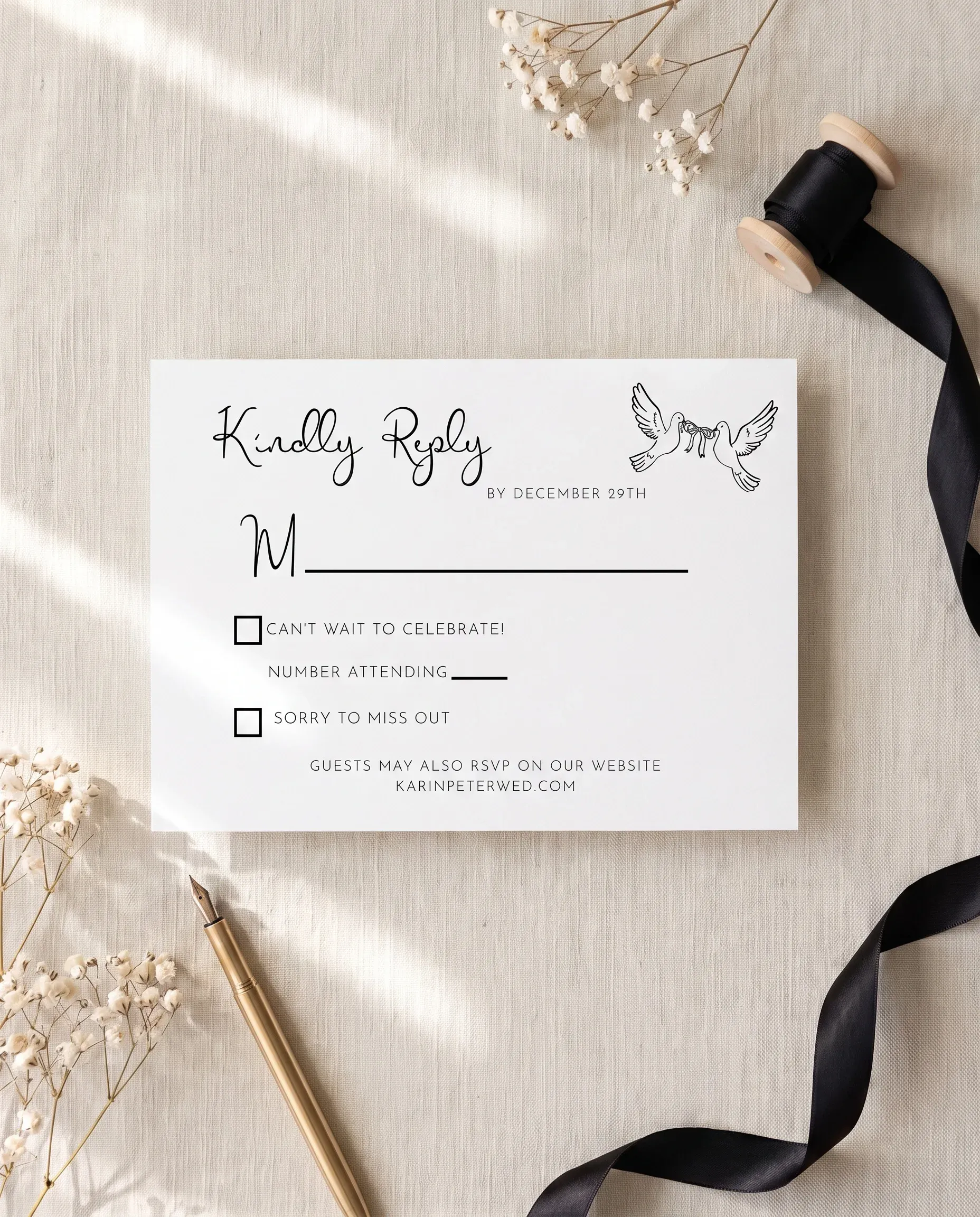 Sketchbook Bow wedding invitation suite — RSVP card shown in a flat lay under soft natural light, wedding RSVP cards