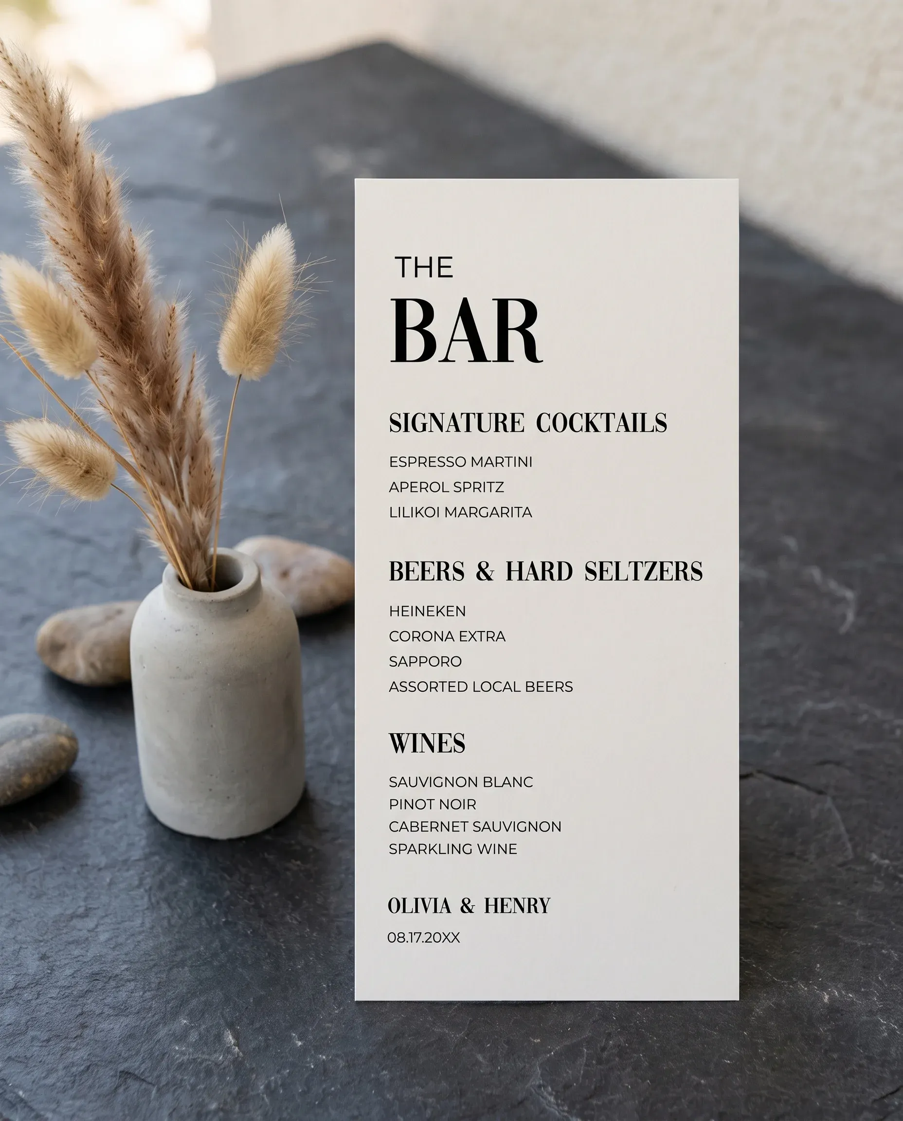 Barline — bar menu page displayed upright under soft natural light at a slight overhead angle, wedding bar sign