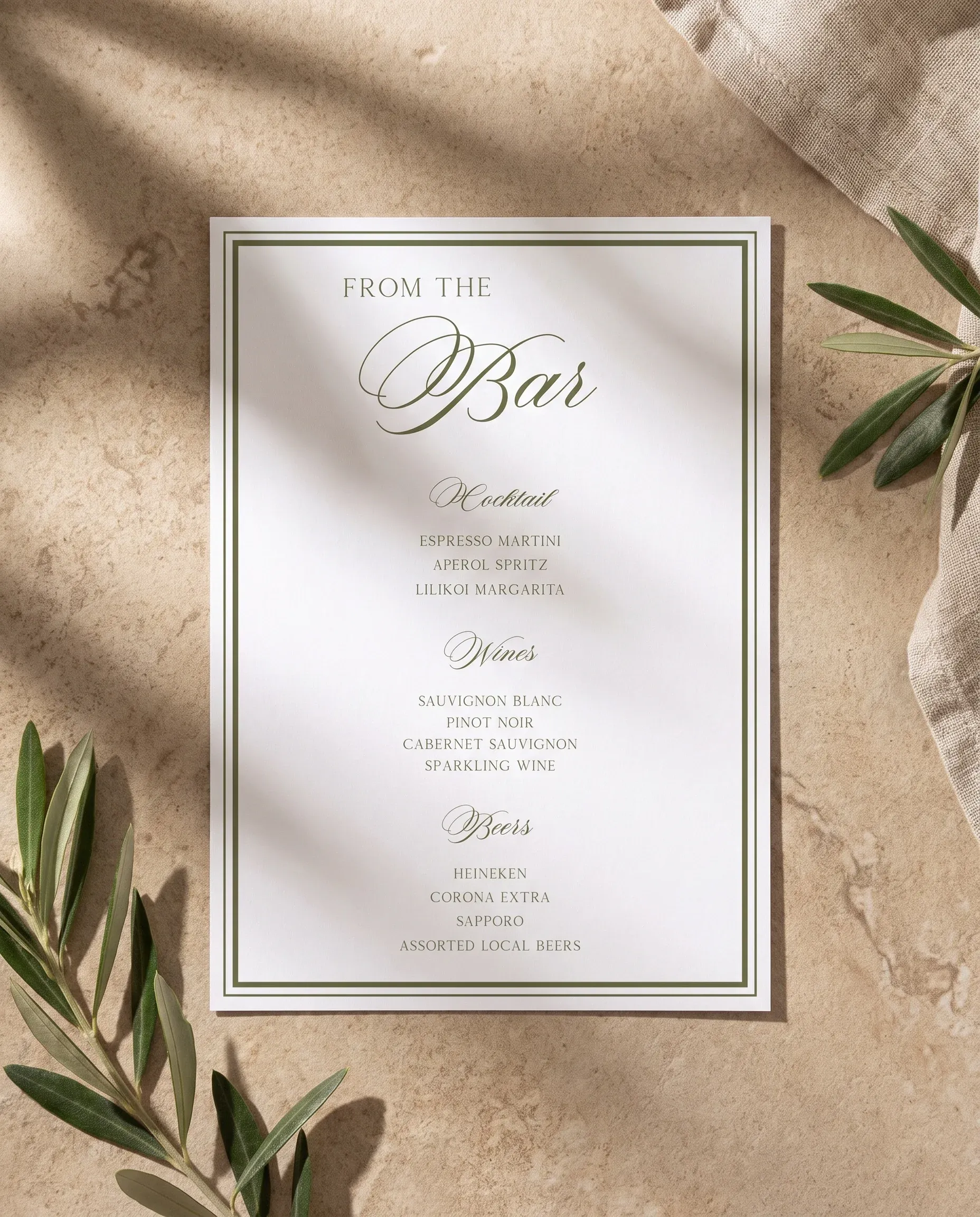 Olive Script — single page bar menu shown flat on premium paper under soft overhead light, wedding bar menu
