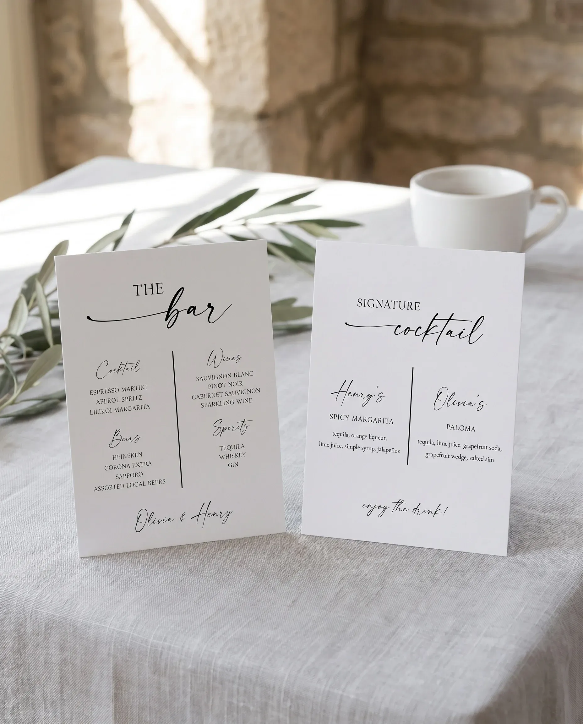 Liminal — Bar Menu displayed upright in a styled setting under soft natural light at a slight overhead angle, wedding bar sign.