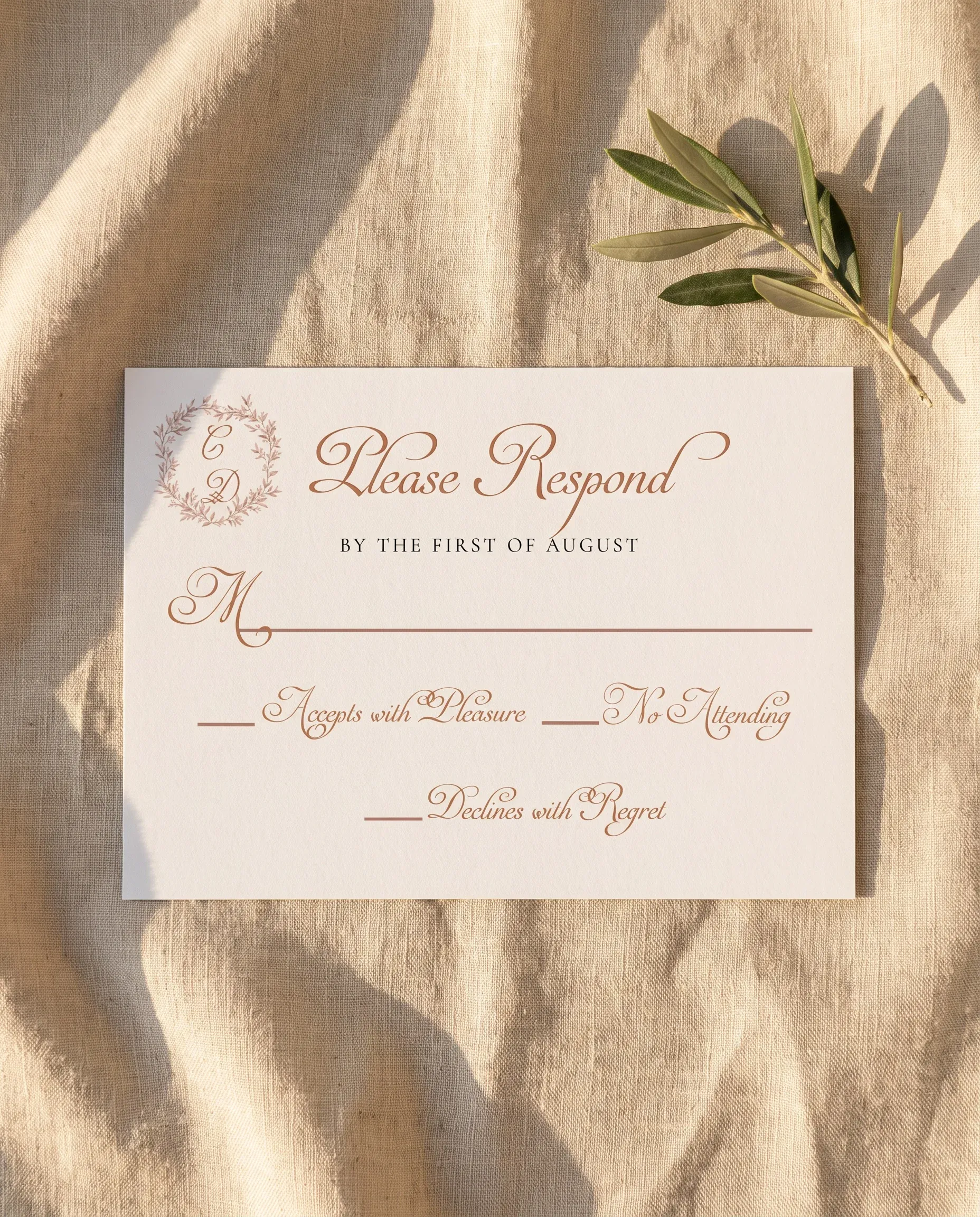 Sepia Sprig wedding invitation suite — RSVP card shown in a flat lay, softly lit overhead on premium editorial paper, wedding RSVP cards.